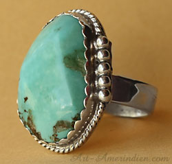 Yes! this sterling silver and turquoise ring is made in USA and signed by American Artist Art Gatzke