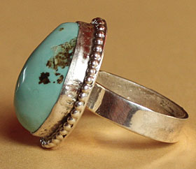 Hand made in south western style turquoise and sterling silver ring