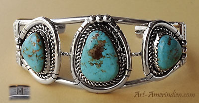 Bracelet Navajo en argent avec 3 turquoises, symboles amérindiens corde, gouttes d'eau, rayons soleil
