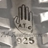 A.T. inside a left hand mark is Aaron Toadlena Navajo silversmith