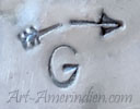 G under broken arrow mark