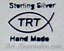 TRT inside a fish symbol hallmark is Travis Teller Navajo