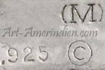 (M) copyrighted mark on Navajo style necklace